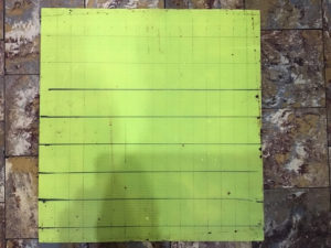 Varroa board marked with a grid to nake counting varroa drop easier